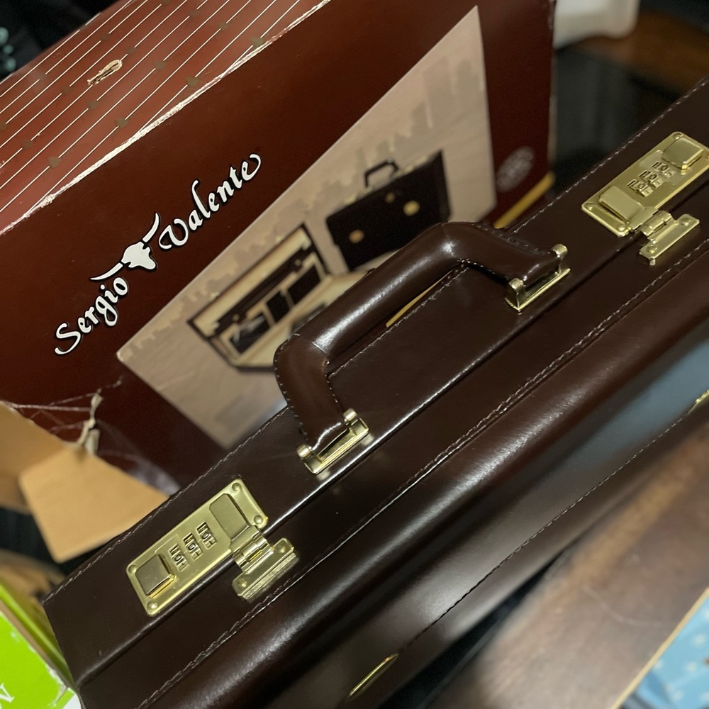 Sergio Valente Dark Brown Leather Case with Gold Accents
